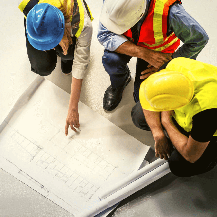 Construction workers in our contractor accommodation in UK analyze their construction plan